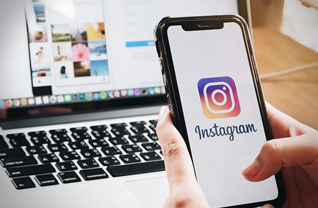 Instagram em duas telas computador e celular.